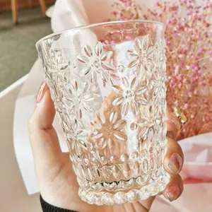 Vintage embossed daisy pattern glass cup for coffee and juice with elegant floral design