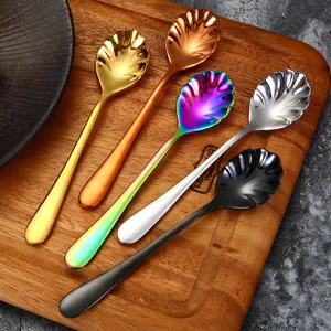 Set of 5 shell-shaped stainless steel spoons in gold, rainbow, and silver finishes.