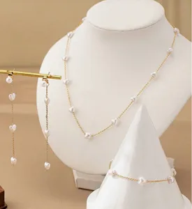 Elegante set di gioielli con collana bracciale e orecchini con perle a cuore oro