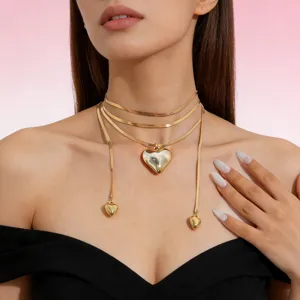 Trendy multi-layer snake chain necklace with large heart pendant for women fashion jewelry.