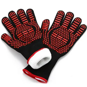 Detailed shot of black heat-resistant BBQ grilling gloves with red silicone dots.