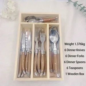 Detailed view of 24pcs stainless steel cutlery set with wood handles in a wooden box