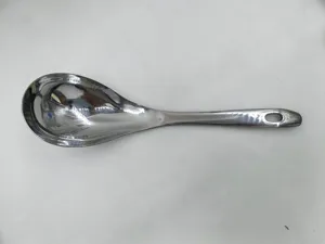 Large stainless steel soup spoon with thick long handle and hanging hole detail for kitchen