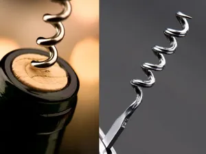 Λεπτομερές κοντινό πλάνο της σπείρας ανοιχτηριού από ανοξείδωτο χάλυβα σε φελλό κρασιού.