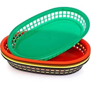Close-up detail showing four colorful oval plastic food serving baskets stacked together.