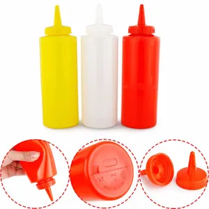 Bouteilles compressibles en plastique de 24oz avec bouchons amovibles montrées en détail
