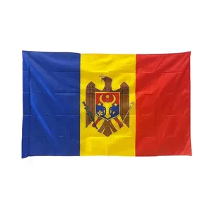 Detail of the Republic of Moldova flag with central coat of arms on polyester fabric