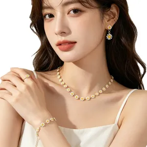Bohemian enamel daisy jewelry set including necklace bracelet and earrings on model.
