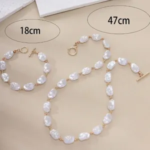 Baroque pearl necklace and bracelet set with golden OT toggle clasp length detail