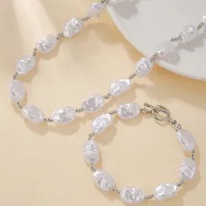 Detail view of French vintage irregular Baroque pearl necklace and bracelet set.