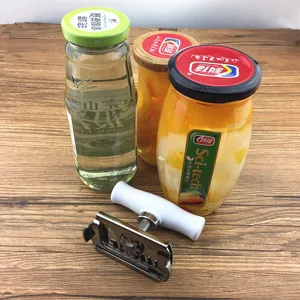 Adjustable stainless steel jar opener tool for effortless lid removal in any kitchen.