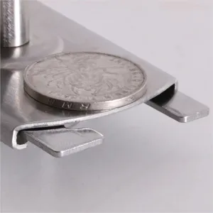 Macro detail showing the thickness of the stainless steel adjustable can opener jaw.