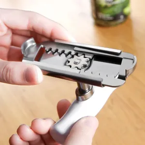 Detail view of the adjustable stainless steel gear mechanism on the manual jar opener