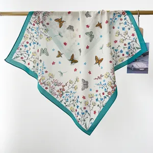Detailed macro view of pastoral butterfly and floral print cotton small square scarf