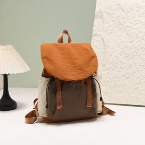 Stylish women's lightweight travel backpack with large capacity and color-block design