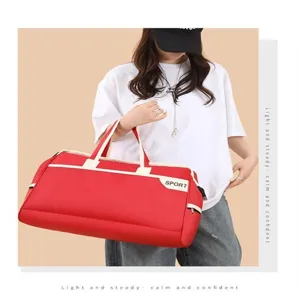 Large red sport travel bag with white handles for gym or short trips