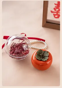 Dekorative Hochzeits-Süßigkeitsbox in Kaki-Form mit klarer Kunststoffkugel-Geschenkverpackung