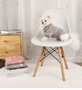 Detailed view of cute pet winter fleece clothes with daisy embroidery for small dogs and cats.