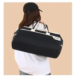 Large black and white travel duffel bag for sports and fitness with shoulder strap