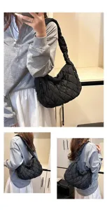 Detailed view of black quilted cloud bag, showcasing soft texture and daily casual style.