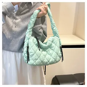 Green quilted cloud shoulder bag, soft dumpling crossbody bag with stylish pleated design.