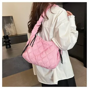 Pink quilted cloud bag for women, stylish pleated hobo shoulder bag with crossbody strap.