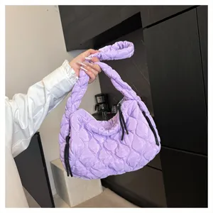 Stylish quilted cloud bag in pastel purple, chic pleated design, spacious casual tote handbag.