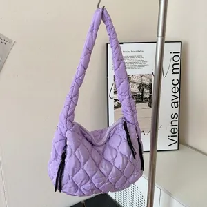 Trendy purple quilted cloud shoulder bag, soft puffer hobo tote handbag for women daily use.