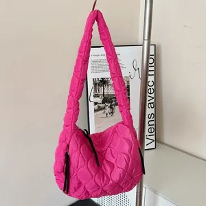 Bright pink quilted cloud shoulder bag for women, stylish pleated large capacity tote bag.