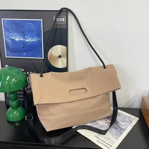 Stylish large khaki nylon messenger bag with black adjustable strap for daily commute