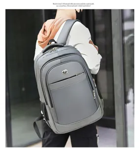 Detailed back view of a grey large capacity casual backpack for travel and business use.