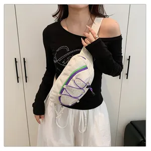 Sporty white crossbody chest bag for women featuring stylish purple drawstring details