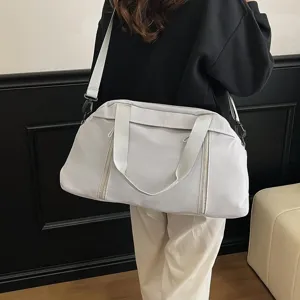 Large lightweight off-white fitness gym bag and travel duffel with adjustable shoulder strap