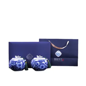 Blue and white porcelain tea canister set with elegant gift box and matching bag