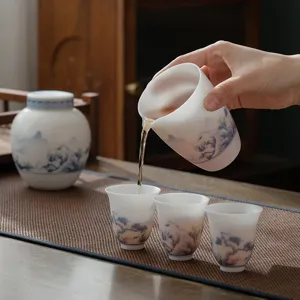 Pregiato set da tè in ceramica giada grasso di montone con pittura paesaggistica