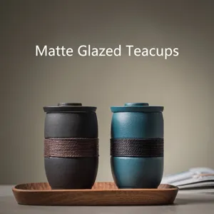 Minimalist matte ceramic tea cup with lid and textured rope wrap insulation for office use