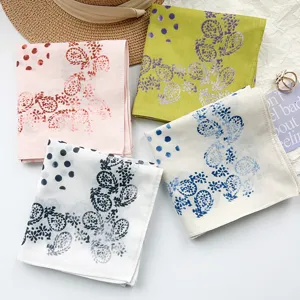 Collection of vintage paisley and polka dot 100% cotton square scarves in soft colors