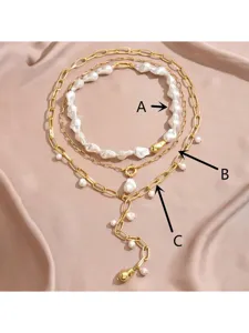 Detail view of the 3-piece baroque pearl layered necklace set, clearly labeled as A, B, and C.
