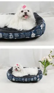 Cozy cartoon cat patterned pet bed with soft grey plush lining and white dog