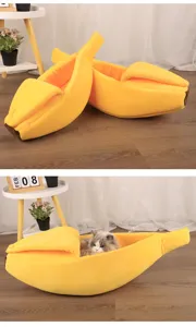 Yellow plush banana-shaped pet bed detail showing cozy semi-enclosed design in home setting