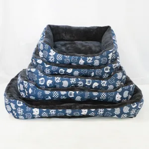 Stacked set of soft Arctic fleece pet beds with blue cartoon cat pattern print.