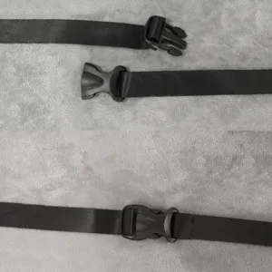 Black nylon pet car seat belt strap with durable plastic quick release buckles for safety.