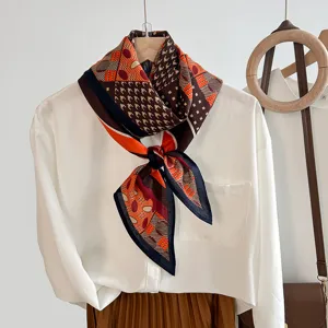 Vintage geometric pattern silk-like scarf in elegant orange and brown tones for women