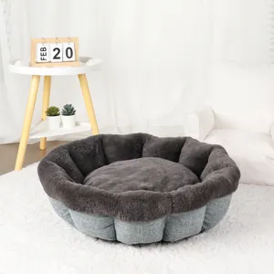 Cozy plush pet bed for cats and dogs, warm round tart design with soft grey fleece and durable linen.