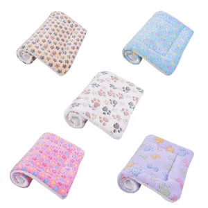 Set of thick plush pet blankets for cats and dogs featuring star and paw print patterns