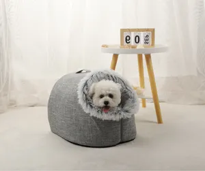 Detailed view of a grey linen pet bed featuring plush faux fur trim and a small dog inside