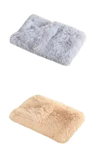 Soft plush pet blanket detail shot, fluffy material closeup showing texture and colors clearly.