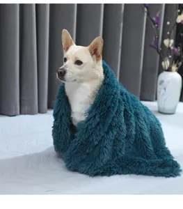 Soft plush pet blanket detail shot showing the fluffy texture and dark teal color for dogs cats.
