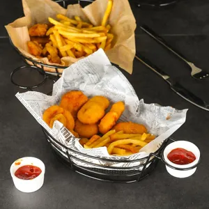 Black iron wire mini fry basket for serving chicken nuggets and fries in restaurant