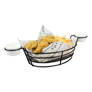 Black iron snack basket with two side sauce cups holding french fries and chicken